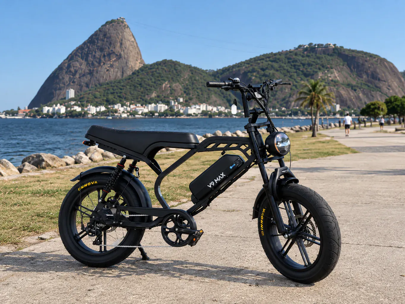V9 Max no Aterro do Flamengo, com o Pão de Açúcar ao fundo